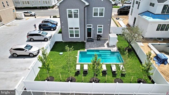3 Laurel St, Rehoboth Beach, DE 19971 - back of house featuring a fenced backyard and entry steps