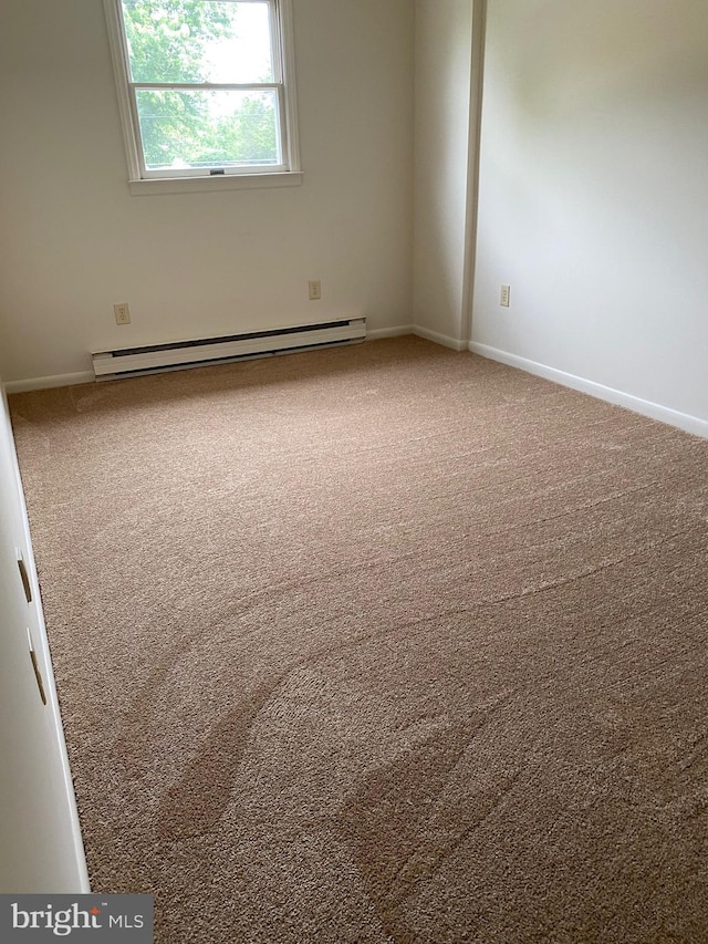 204 Marion Ave, Carlisle, PA 17013 - carpeted empty room featuring a baseboard heating unit and baseboards