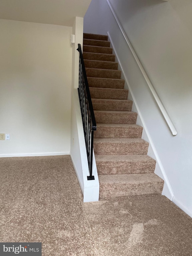 204 Marion Ave, Carlisle, PA 17013 - stairs featuring carpet floors and baseboards