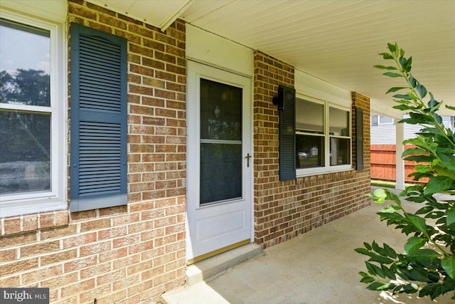 643 University Dr, Waldorf, MD 20602 - property entrance with covered porch and brick siding
