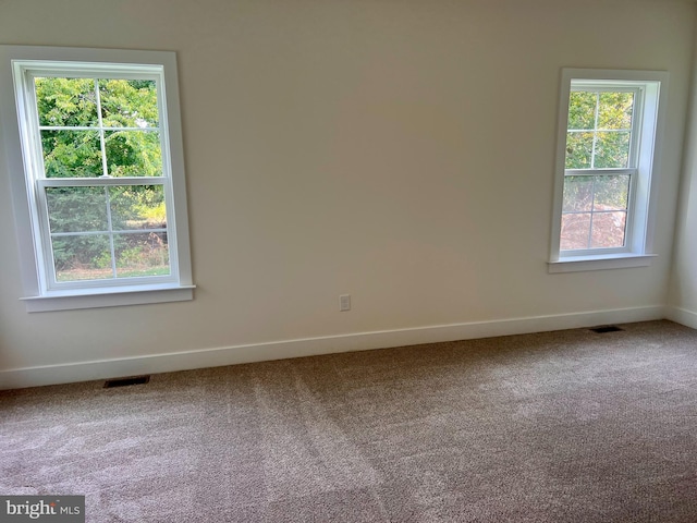 34232 Brenner Ln, Lewes, DE 19958 - carpeted empty room featuring baseboards