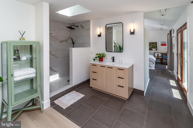 2539 Aquetong Rd, New Hope, PA 18938 - bathroom featuring a skylight, vanity, walk in shower, and ensuite bathroom
