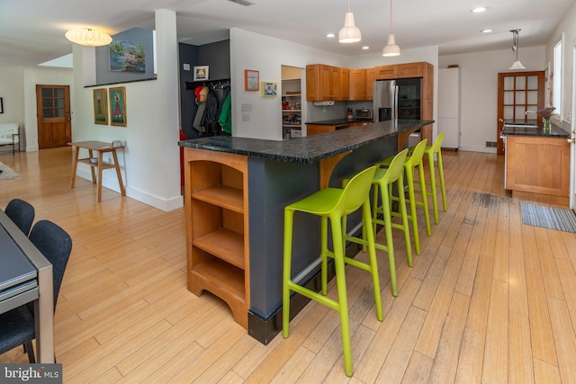 2539 Aquetong Rd, New Hope, PA 18938 - kitchen with light wood-style floors, stainless steel refrigerator with ice dispenser, recessed lighting, and baseboards