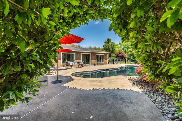 2539 Aquetong Rd, New Hope, PA 18938 - outdoor pool featuring a patio and french doors