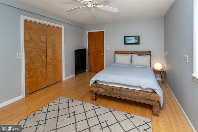 2539 Aquetong Rd, New Hope, PA 18938 - bedroom with light wood-type flooring, baseboards, ceiling fan, and a closet