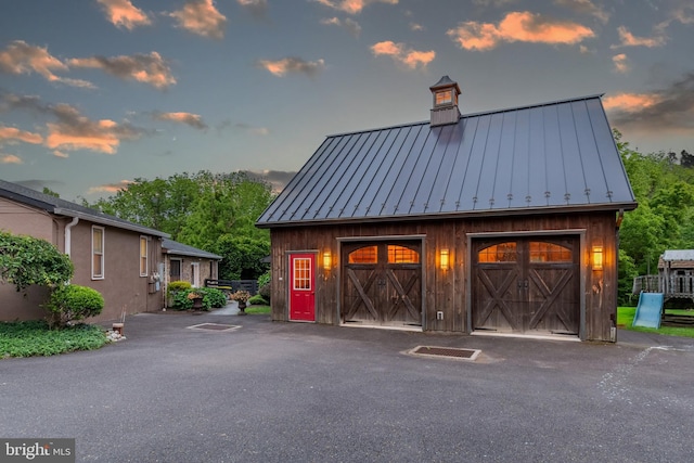 2539 Aquetong Rd, New Hope, PA 18938 - garage at dusk featuring a garage