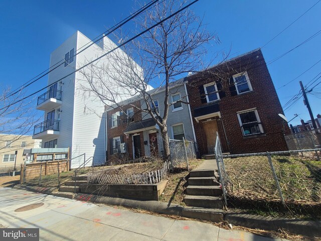 811 18th St NE, Washington, DC 20002 - view of front facade featuring brick siding