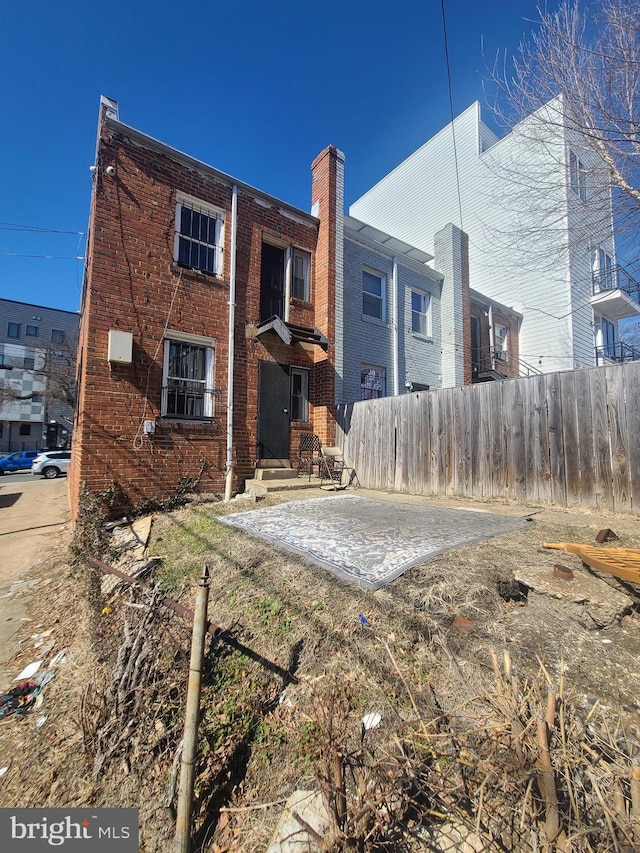 811 18th St NE, Washington, DC 20002 - back of house featuring brick siding
