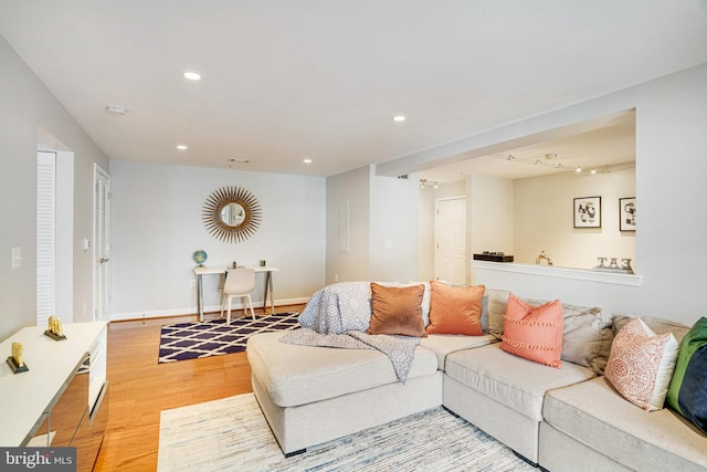 4149 S Four Mile Run Dr Unit 201, Arlington, VA 22204 - living room with light wood finished floors and recessed lighting
