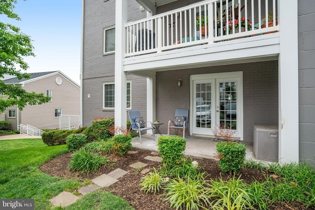 4149 S Four Mile Run Dr Unit 201, Arlington, VA 22204 - property entrance featuring brick siding and a balcony