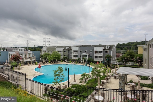 4149 S Four Mile Run Dr Unit 201, Arlington, VA 22204 - community pool featuring a patio area