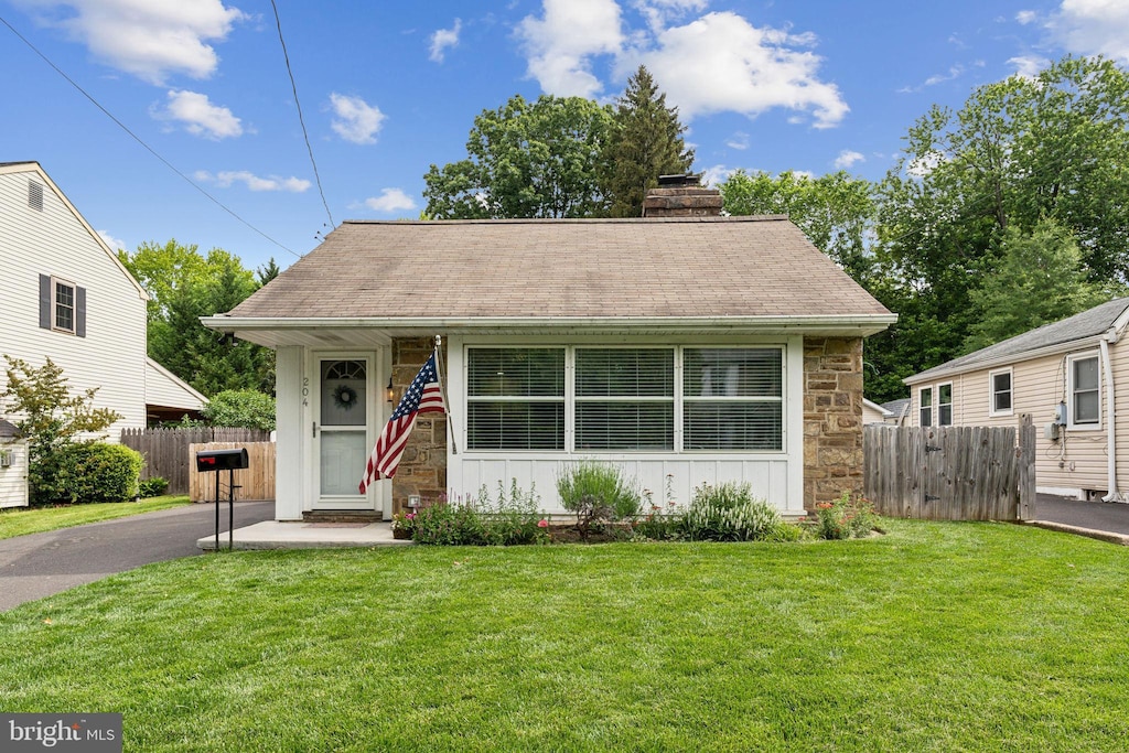 204 Yeakel Ave, Erdenheim, PA 19038 - bungalow-style home featuring stone siding and a chimney