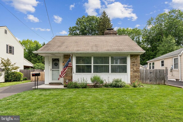 204 Yeakel Ave, Erdenheim, PA 19038 - bungalow-style home featuring stone siding and a chimney