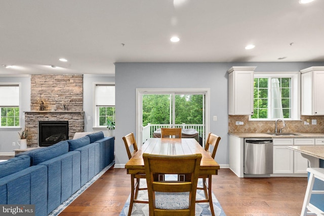 1509 Blakes Legacy Dr, Bel Air, MD 21014 - dining space featuring hardwood / wood-style flooring, recessed lighting, and a stone fireplace