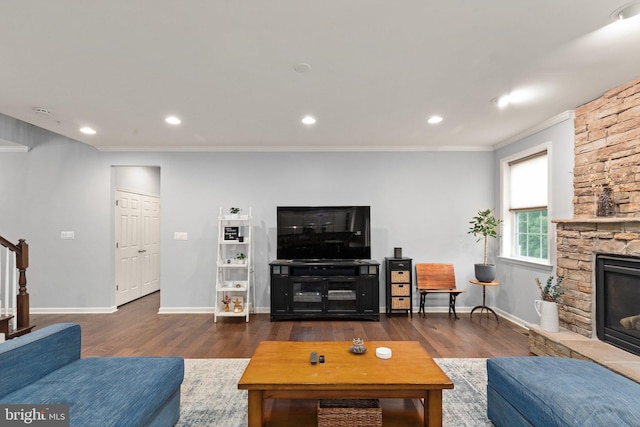 1509 Blakes Legacy Dr, Bel Air, MD 21014 - living area featuring stairway, wood finished floors, crown molding, a fireplace, and recessed lighting