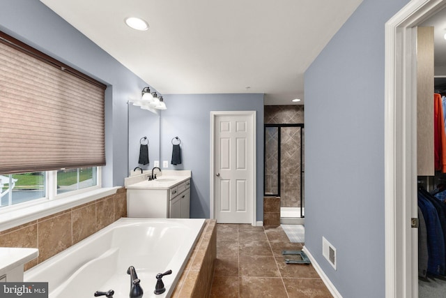 1509 Blakes Legacy Dr, Bel Air, MD 21014 - bathroom with vanity, a garden tub, a shower stall, and tile patterned flooring
