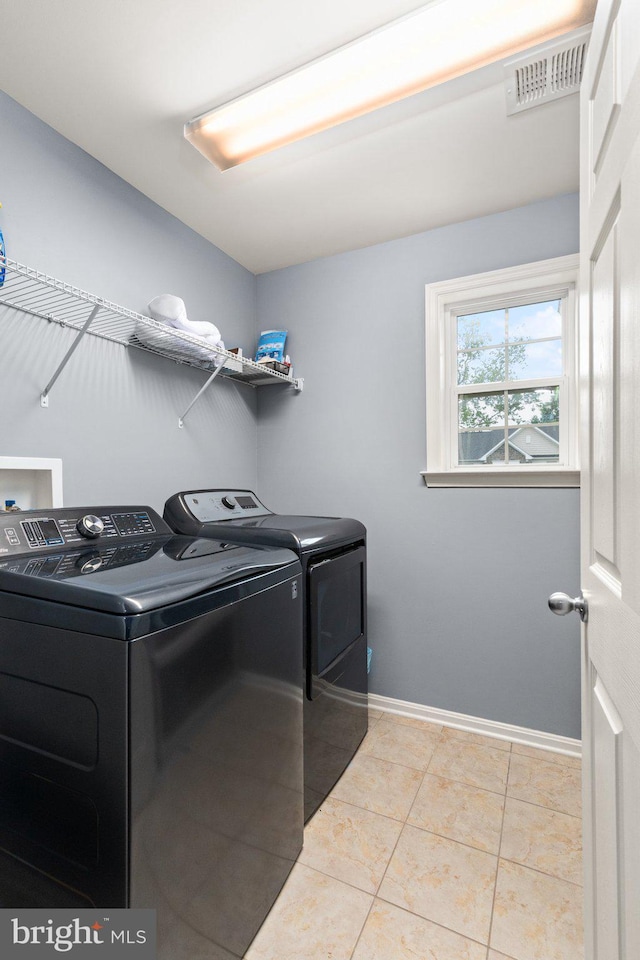 1509 Blakes Legacy Dr, Bel Air, MD 21014 - washroom featuring washing machine and clothes dryer and light tile patterned floors