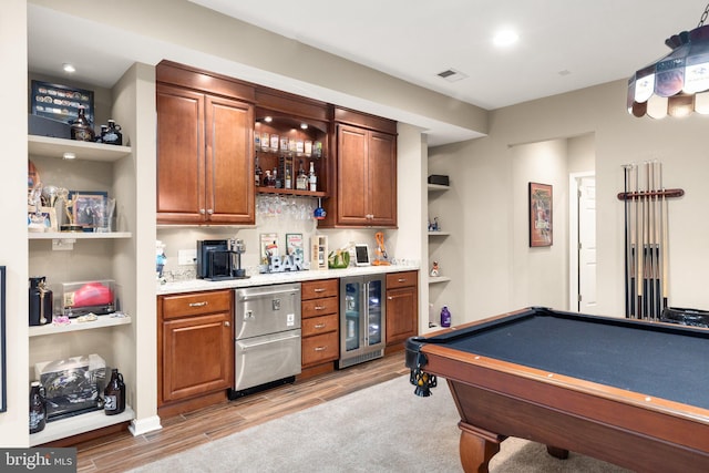 1509 Blakes Legacy Dr, Bel Air, MD 21014 - indoor wet bar featuring wine cooler, light wood-style flooring, dishwashing machine, pool table, and recessed lighting