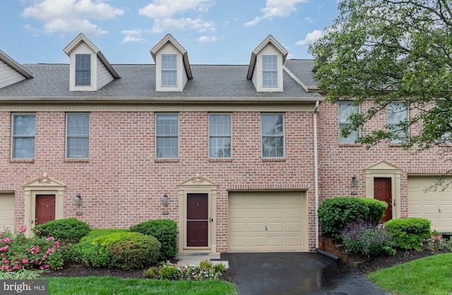 1286 Timber View Dr, Mechanicsburg, PA 17050 - view of front of house with a shingled roof, brick siding, and asphalt driveway