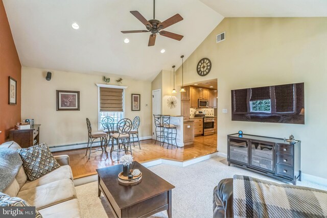 622 Hutchinson Ter, Holmes, PA 19043 - living room with ceiling fan, high vaulted ceiling, a baseboard heating unit, and recessed lighting