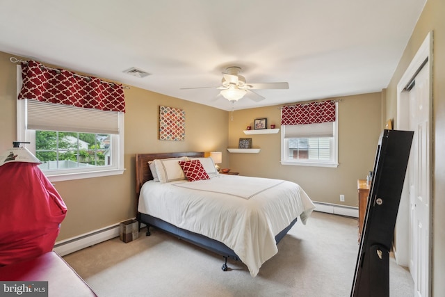 622 Hutchinson Ter, Holmes, PA 19043 - carpeted bedroom featuring a baseboard heating unit and a ceiling fan
