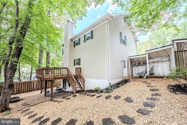 10024 Park Woods Ln, Burke, VA 22015 - back of house with stairs, a deck, and a chimney