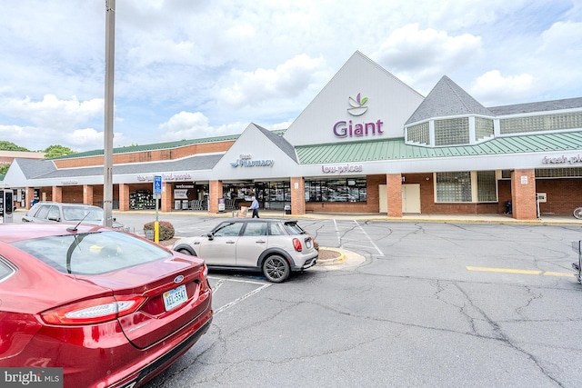 10024 Park Woods Ln, Burke, VA 22015 - view of commercial property with uncovered parking