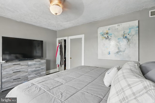 2530 Arunah Ave, Baltimore, MD 21216 - bedroom with a closet and a textured ceiling