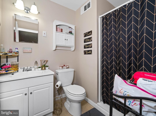 1210 Chelmsford Cir Unit 1210, Newark, DE 19713 - bathroom featuring vanity, toilet, a shower with curtain, tile patterned floors, and baseboards