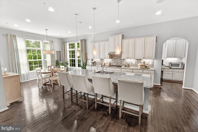 6808 Rehnquist Ct, New Market, MD 21774 - kitchen featuring stainless steel appliances, backsplash, a sink, dark wood-style flooring, and recessed lighting