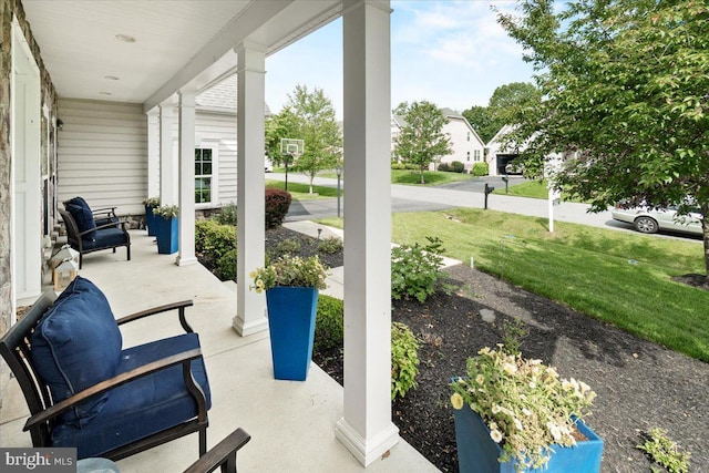 6808 Rehnquist Ct, New Market, MD 21774 - covered porch featuring a yard