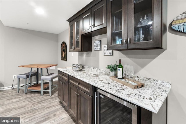 6808 Rehnquist Ct, New Market, MD 21774 - indoor dry bar featuring wine cooler, light wood-style flooring, and baseboards