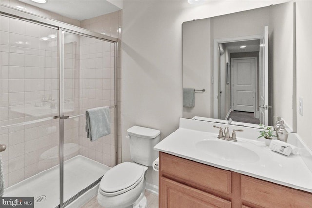6808 Rehnquist Ct, New Market, MD 21774 - bathroom featuring vanity, toilet, and a stall shower