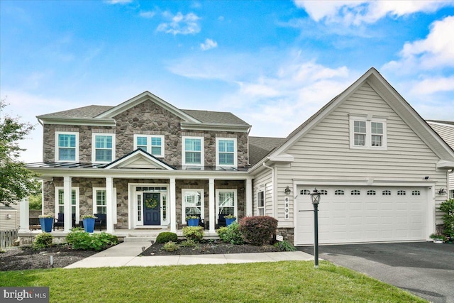 6808 Rehnquist Ct, New Market, MD 21774 - view of front facade featuring stone siding, a porch, driveway, an attached garage, and a front lawn