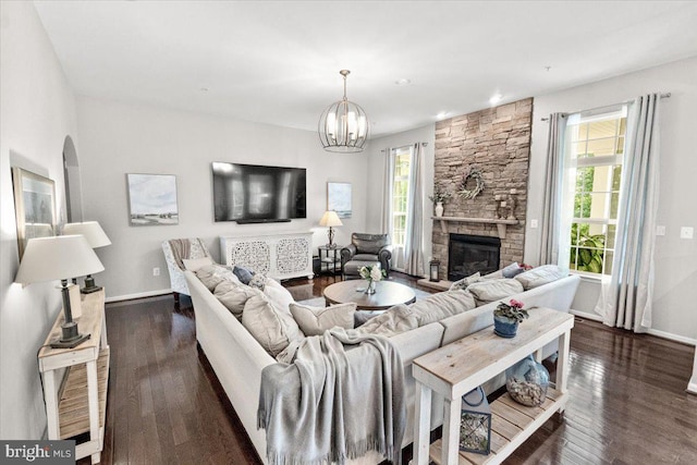 6808 Rehnquist Ct, New Market, MD 21774 - living room featuring a fireplace, a chandelier, dark wood-style floors, baseboards, and recessed lighting