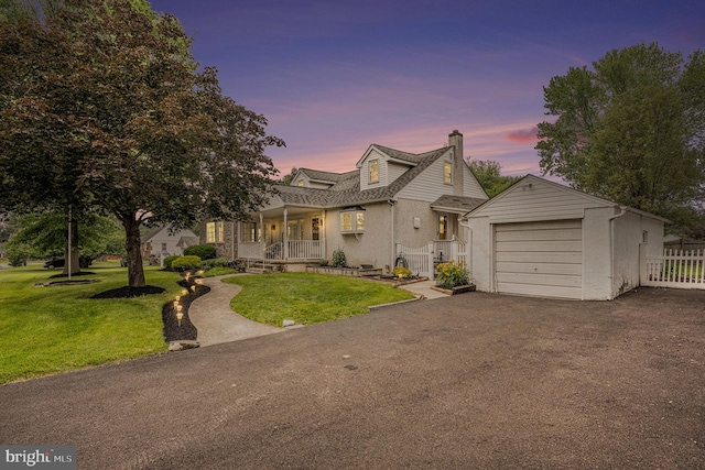 787 Park Rd, Lansdale, PA 19446 - traditional-style house with a chimney, covered porch, asphalt driveway, and a gate