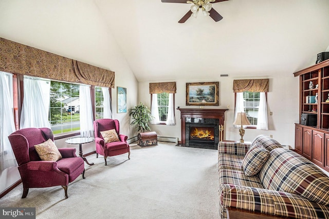 787 Park Rd, Lansdale, PA 19446 - living area with carpet, a high end fireplace, ceiling fan, a baseboard heating unit, and high vaulted ceiling