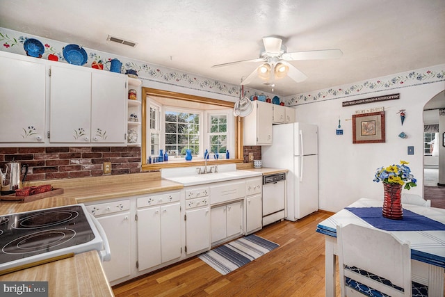 787 Park Rd, Lansdale, PA 19446 - kitchen with white appliances, a ceiling fan, light wood finished floors, and light countertops