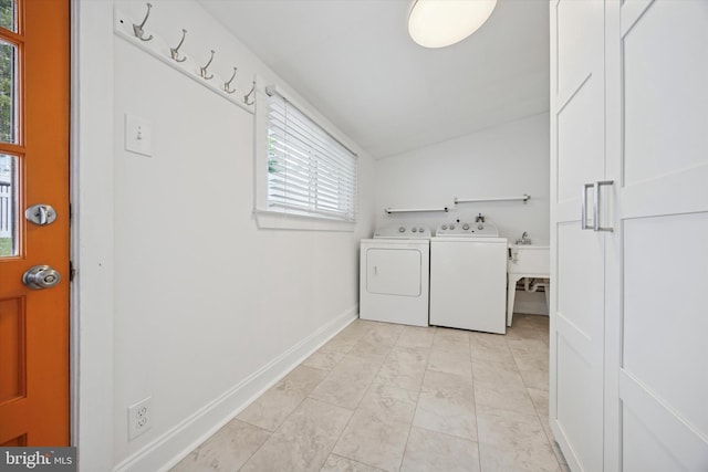 534 Spring Mill Ave, Conshohocken, PA 19428 - laundry room with washing machine and clothes dryer, plenty of natural light, baseboards, and light marble finish floors
