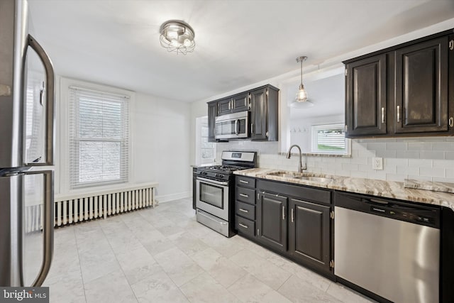 534 Spring Mill Ave, Conshohocken, PA 19428 - kitchen with stainless steel appliances, a sink, backsplash, and light stone counters