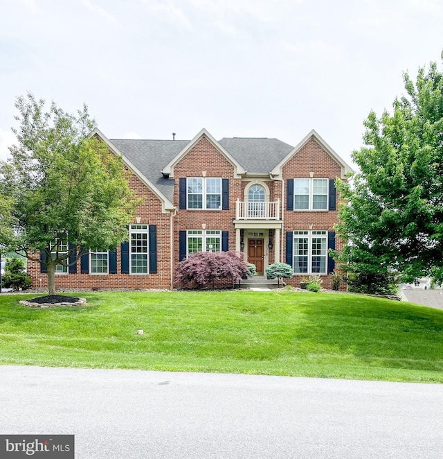 11516 Mystic Rock Ln N, Waynesboro, PA 17268 - colonial-style house with a front lawn, brick siding, and roof with shingles