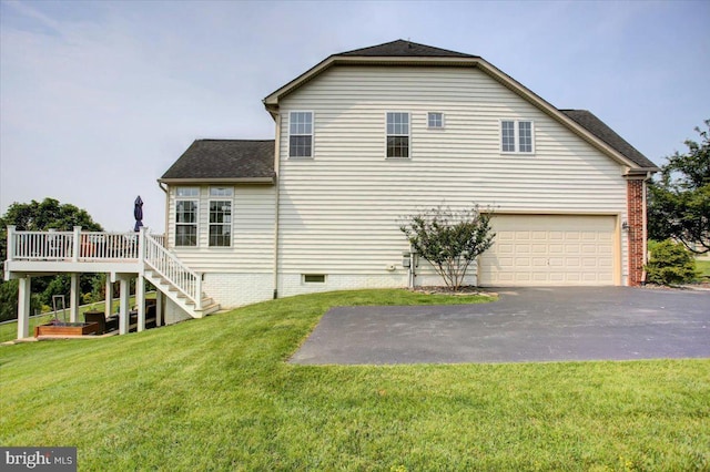 11516 Mystic Rock Ln N, Waynesboro, PA 17268 - view of side of home featuring an attached garage, driveway, roof with shingles, a lawn, and a deck