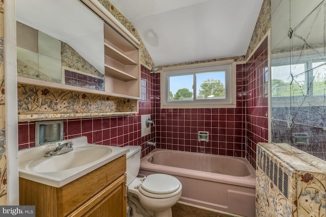 54 Cobalt Ridge Dr E, Levittown, PA 19057 - full bath featuring vanity, toilet, shower / bath combination, lofted ceiling, and tile walls