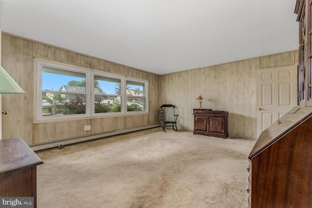54 Cobalt Ridge Dr E, Levittown, PA 19057 - spare room featuring a baseboard radiator, carpet floors, and wood walls