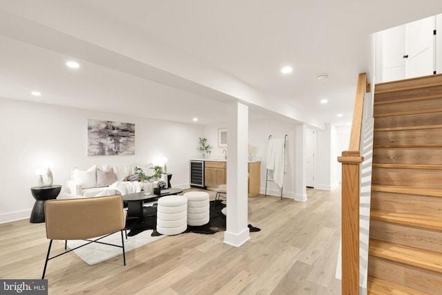 4308 4th St NW, Washington, DC 20011 - living room with stairway, light wood-type flooring, baseboards, recessed lighting, and beverage cooler