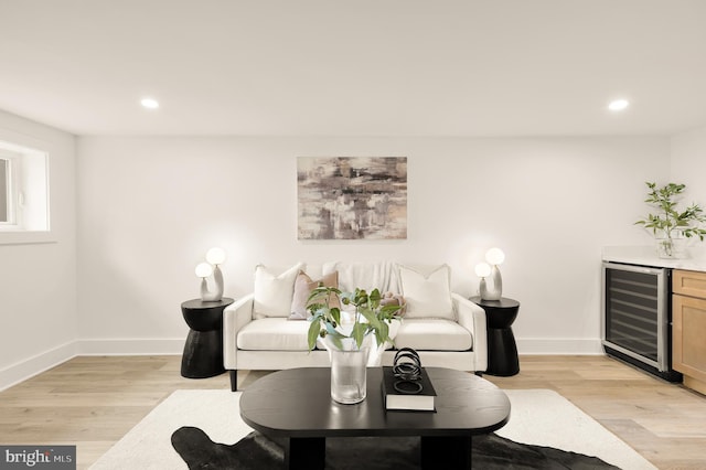 4308 4th St NW, Washington, DC 20011 - living area with wine cooler, recessed lighting, light wood-type flooring, baseboards, and bar