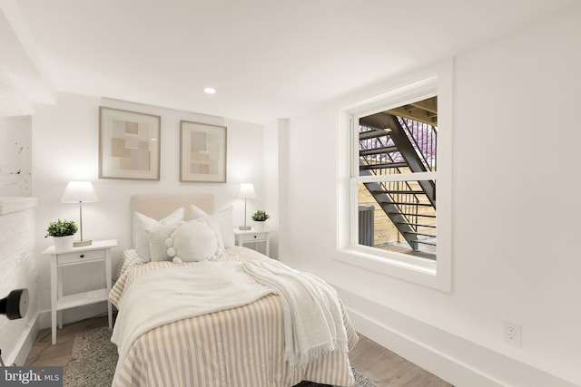 4308 4th St NW, Washington, DC 20011 - bedroom with wood finished floors, baseboards, and recessed lighting
