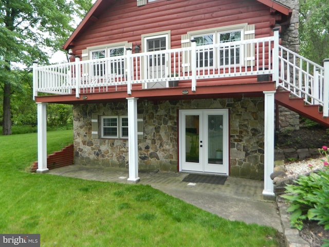 126 Ivy Ln, Lock Haven, PA 17745 - rear view of property with stone siding, a deck, a yard, log exterior, and stairs