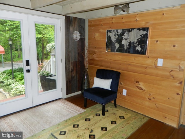 126 Ivy Ln, Lock Haven, PA 17745 - living area with french doors, wood walls, and wood finished floors