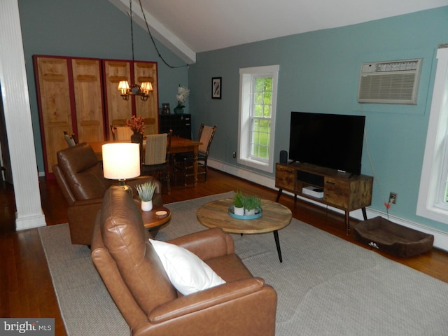 126 Ivy Ln, Lock Haven, PA 17745 - living area featuring lofted ceiling, a chandelier, a wall mounted AC, wood finished floors, and baseboards